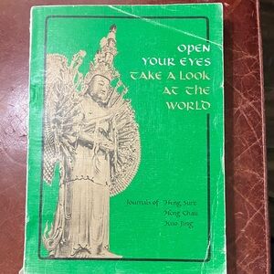 Green Book with Gold Statue Cover
